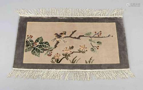 Silk carpet bird and blossoms,