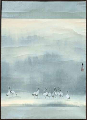 Manchurian cranes in a wide sn