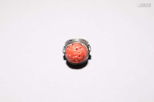 A coral ring.