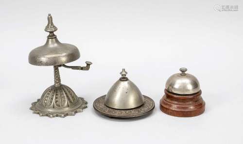 3 hotel or reception bells, around