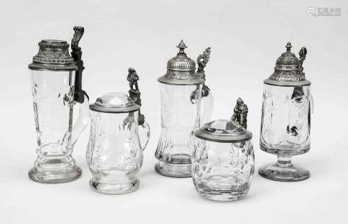 Five glass beer steins with tin hin