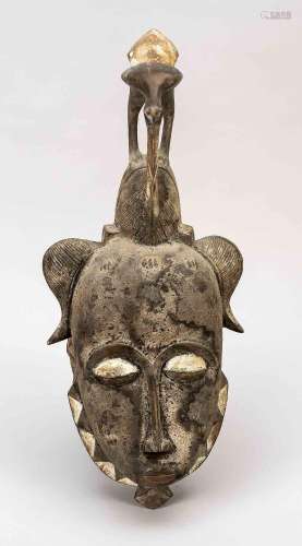 African cult mask, wood with reed b