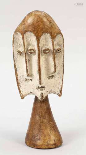 Many-faced double-headed sculpture,