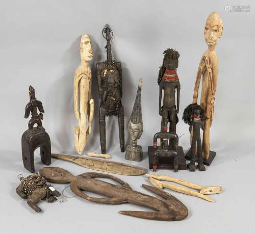 10 African sculptures and a paddle,
