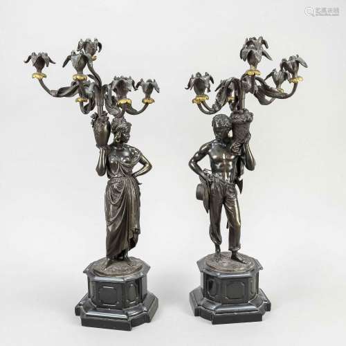 Pair of figural candelabra on marbl