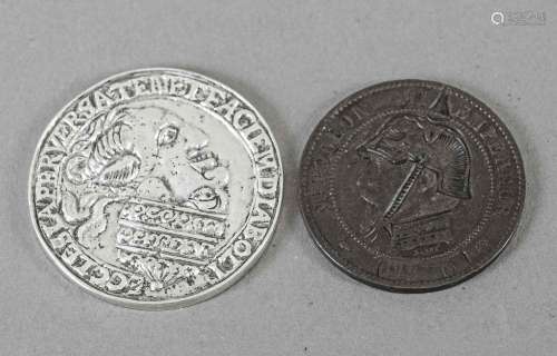 2 mockery coins, 1x double-headed m