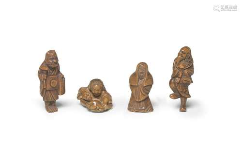 FOUR WOOD FIGURE NETSUKE Edo period (1615-1868) to Meiji era...