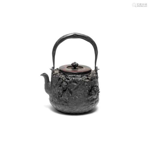 A CYLINDRICAL TETSUBIN (IRON TEA KETTLE) AND BRONZE COVER Me...