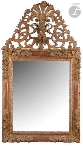 Miroir en bois doré, l’enc