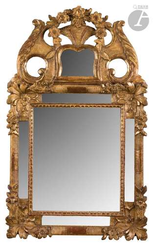 Miroir en bois doré, le fro