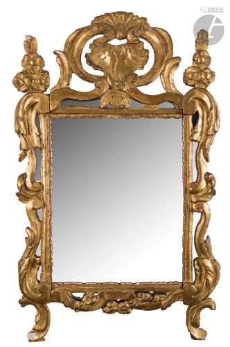 Miroir en bois doré à déc