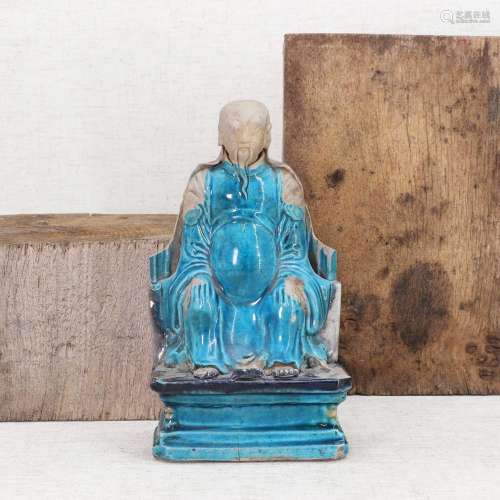 A Chinese turquoise-glazed figure,