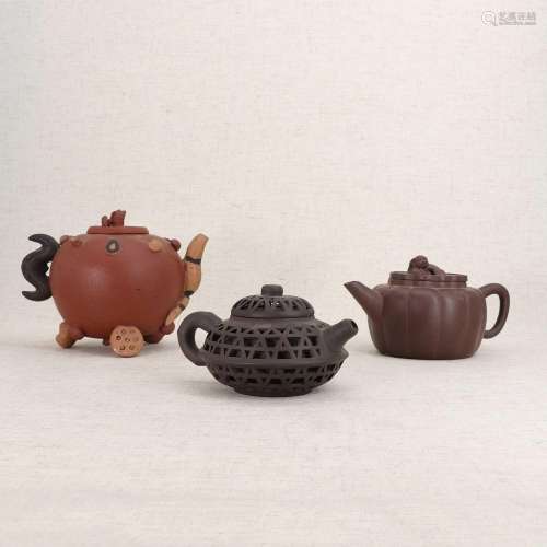 Three Chinese Yixing stoneware teapots,