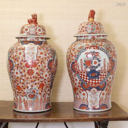 A pair of large Japanese Imari vases and covers,