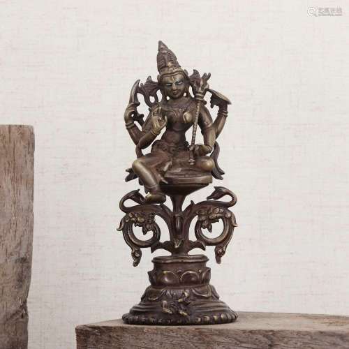 A bronze bodhisattva,