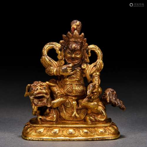 A Tibeto-Chinese Bronze-gilt Figure of Jambhala