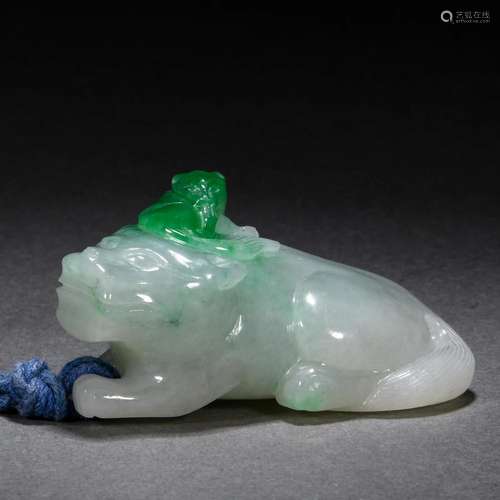 A Chinese Carved Jadeite Pendant