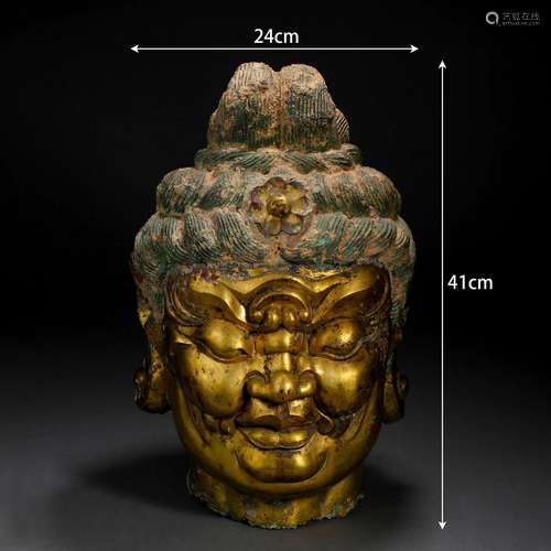 A Tibetan Bronze-gilt Head of Protector