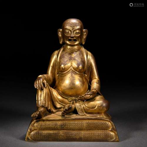 A Tibetan Bronze-gilt Figure of Master