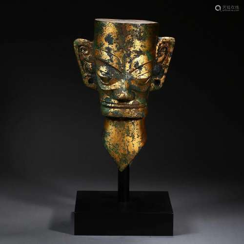 A Tibetan Bronze-gilt Humanoid Mask