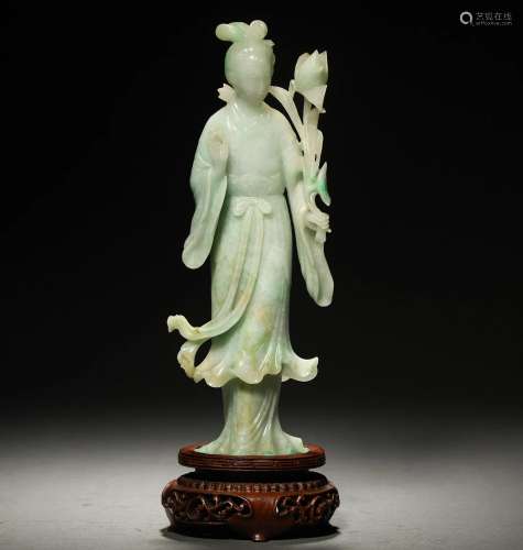 A Chinese Carved Jadeite Standing Long Eliza