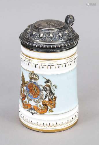 Porcelain beer stein with silver hin