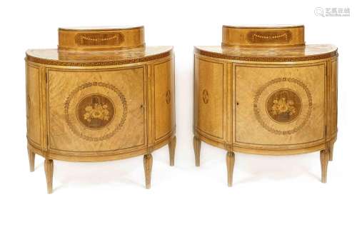 Pair of half-round chests of drawers