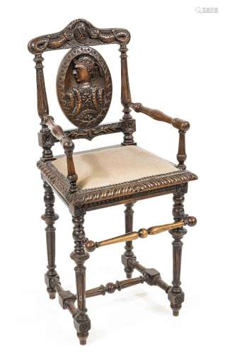 A stately children's high chair arou
