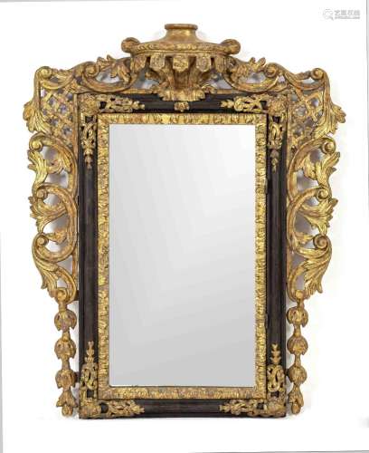 Large mirror in a magnificent frame,