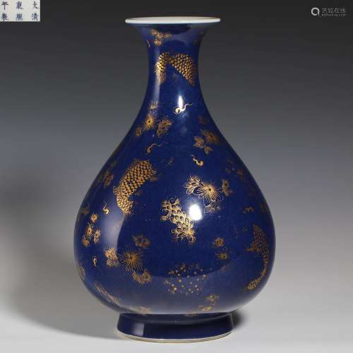 Jade spring vase with blue glaze painted with gold from Qing...