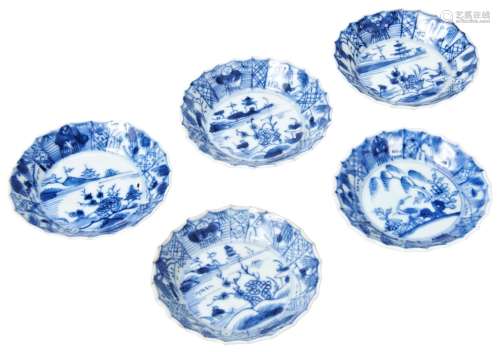 SET OF FOUR SMALL BLUE AND WHITE SAUCER DISHES QING DYNASTY,...