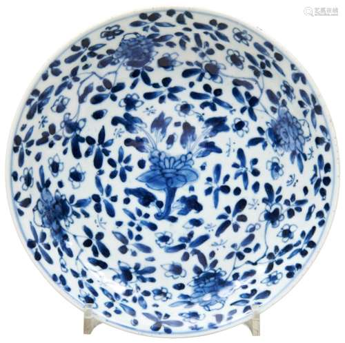 BLUE AND WHITE DISH KANGXI PERIOD densely painted in tones o...