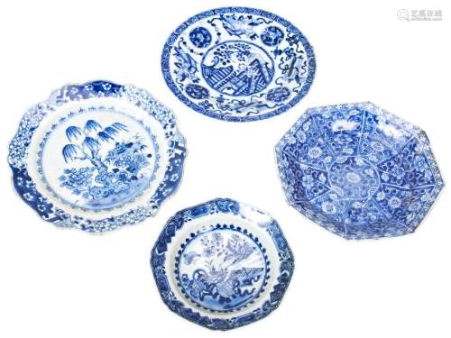FOUR BLUE AND WHITE DISHES QING DYNASTY, 18TH CENTURY with f...