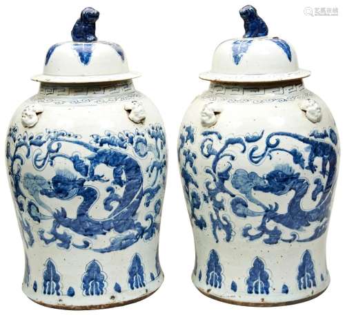 PAIR OF CHINESE BLUE AND WHITE DRAGON JARS AND COVERS 20TH C...