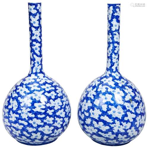 PAIR OF LARGE CRACKED-ICE BLUE AND WHITE BOTTLE VASES QING D...