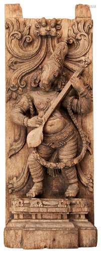 A GOOD CARVED WOODEN ARCHITECTURAL PANEL DEPICTING A HINDU C...