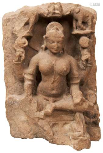 A CARVED STONE MULTI-ARMED FEMALE DEITY, INDIAN, Possibly La...