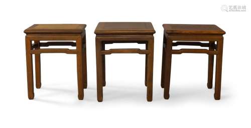 A set of three Chinese rosewood stools, 20th century, each s...