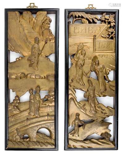 A pair of Chinese giltwood panels, early 20th century, carve...