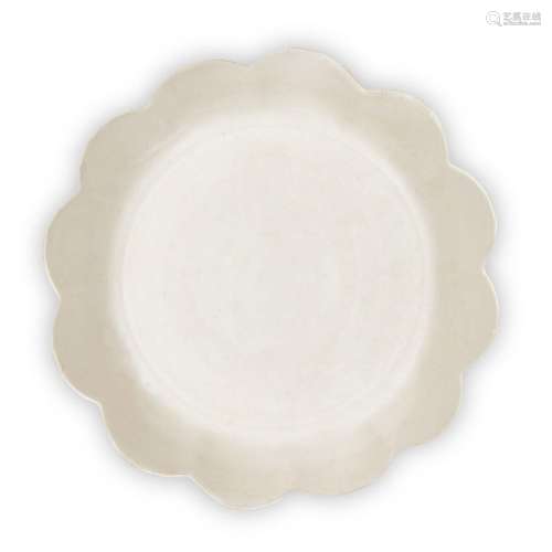 A Chinese Dingyao white-glazed twelve-petal 'floral' dish, S...
