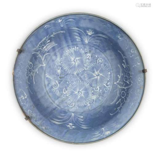 A large Chinese Zhangzhou slip-decorated blue-ground bowl, L...