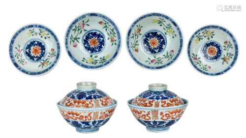 A pair of Chinese blue and white and famille rose tea bowls ...