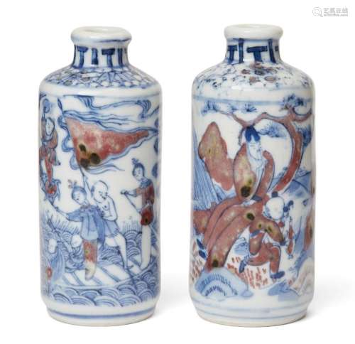 A pair of Chinese blue and white underglaze-red snuff bottle...