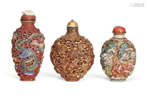 Three Chinese moulded snuff bottles, 19th century, one decor...