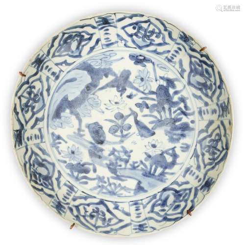 A large Chinese Swatow blue and white 'duck' charger, Ming d...