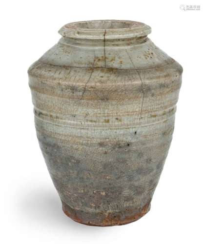 A Chinese crackle glaze jar, Ming dynasty, raised on a flat ...