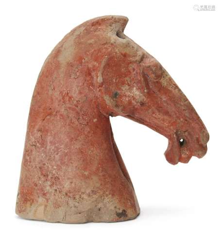 A Chinese red-painted pottery head of a horse, Han dynasty, ...
