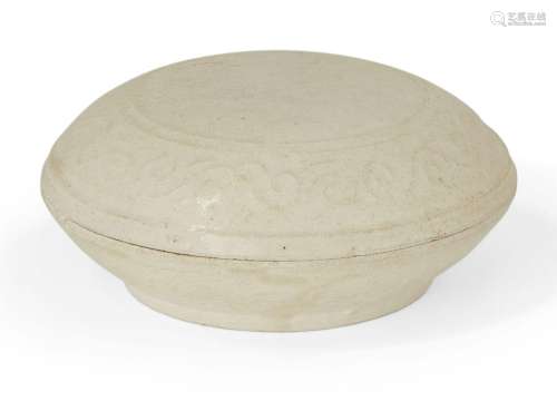 A Chinese white glazed porcelain circular box and cover, Yua...