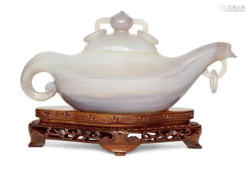 A Chinese agate teapot and cover, Republic period, of elonga...