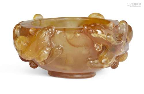 A Chinese agate 'chilong' water pot, 19th century, carved to...